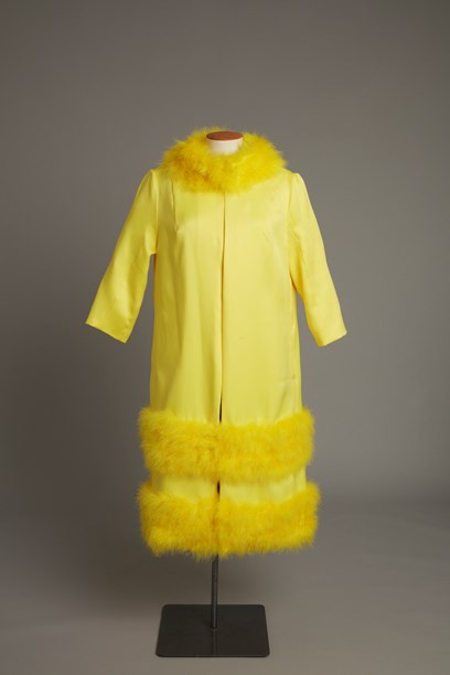 Yellow coat with feather trim image item